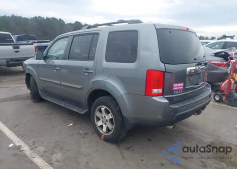 2009 Honda Pilot Touring z USA, uszkodzony, nr VIN 5FNYF48849B029552